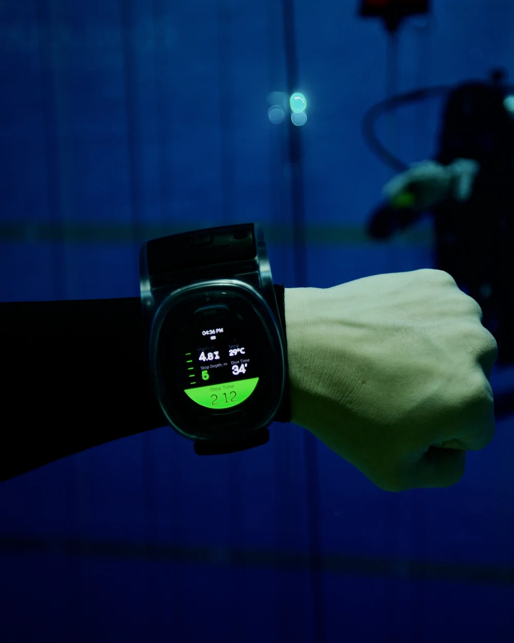 WatchDive worn on a wrist underwater