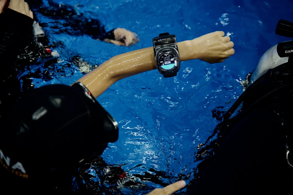 WatchDive on a diver’s wrist in the pool